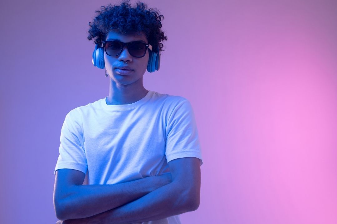 18 years old boy with headphones on