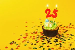 25th birthday cake with candles