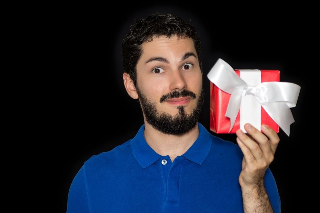 Happy boyfriend with his present