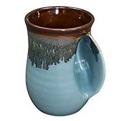 clay in motion handwarmer mug
