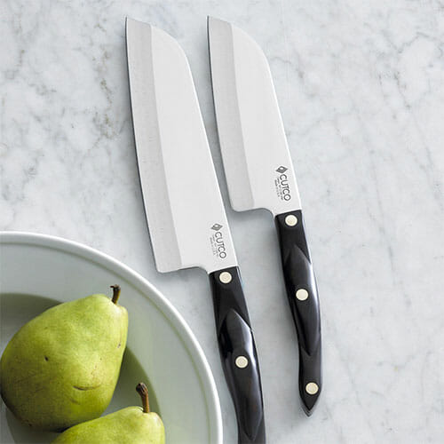cutco chef knives on a kitchen countertop