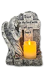 figurine with flameless candle