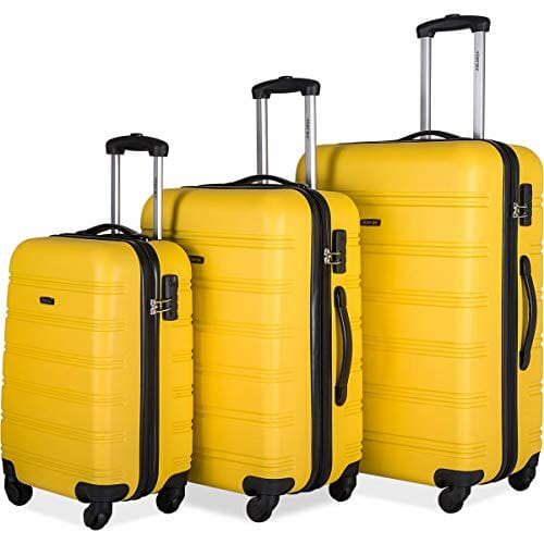 three size yellow suitcases