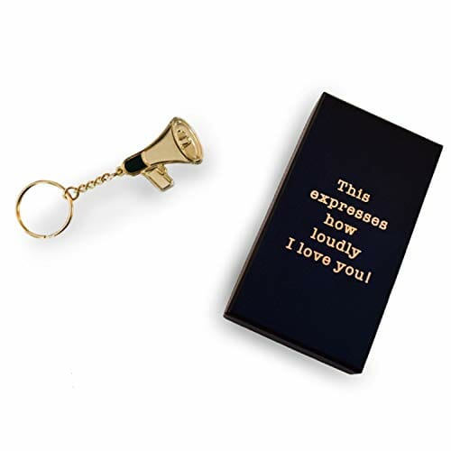 golden keychain in the shape of a megaphone