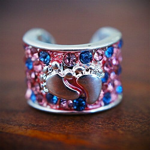 stethoscope charm with baby feet on it