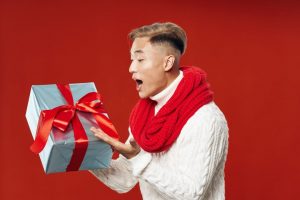 19 years old man with a gift box